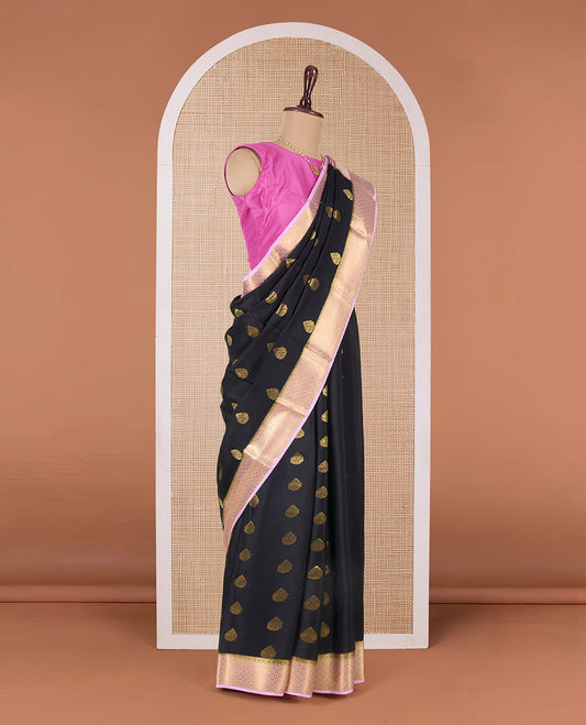 Black zari buttas Mysore silk saree, contrast jaal patterned border, and traditional zari design pallu