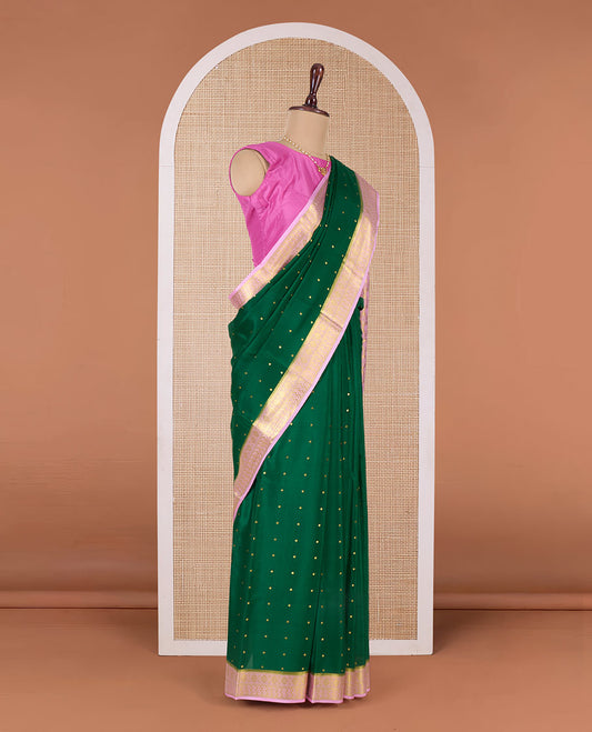 Green zari buttas Mysore silk saree, contrast traditional zari border, and pallu of jaal design