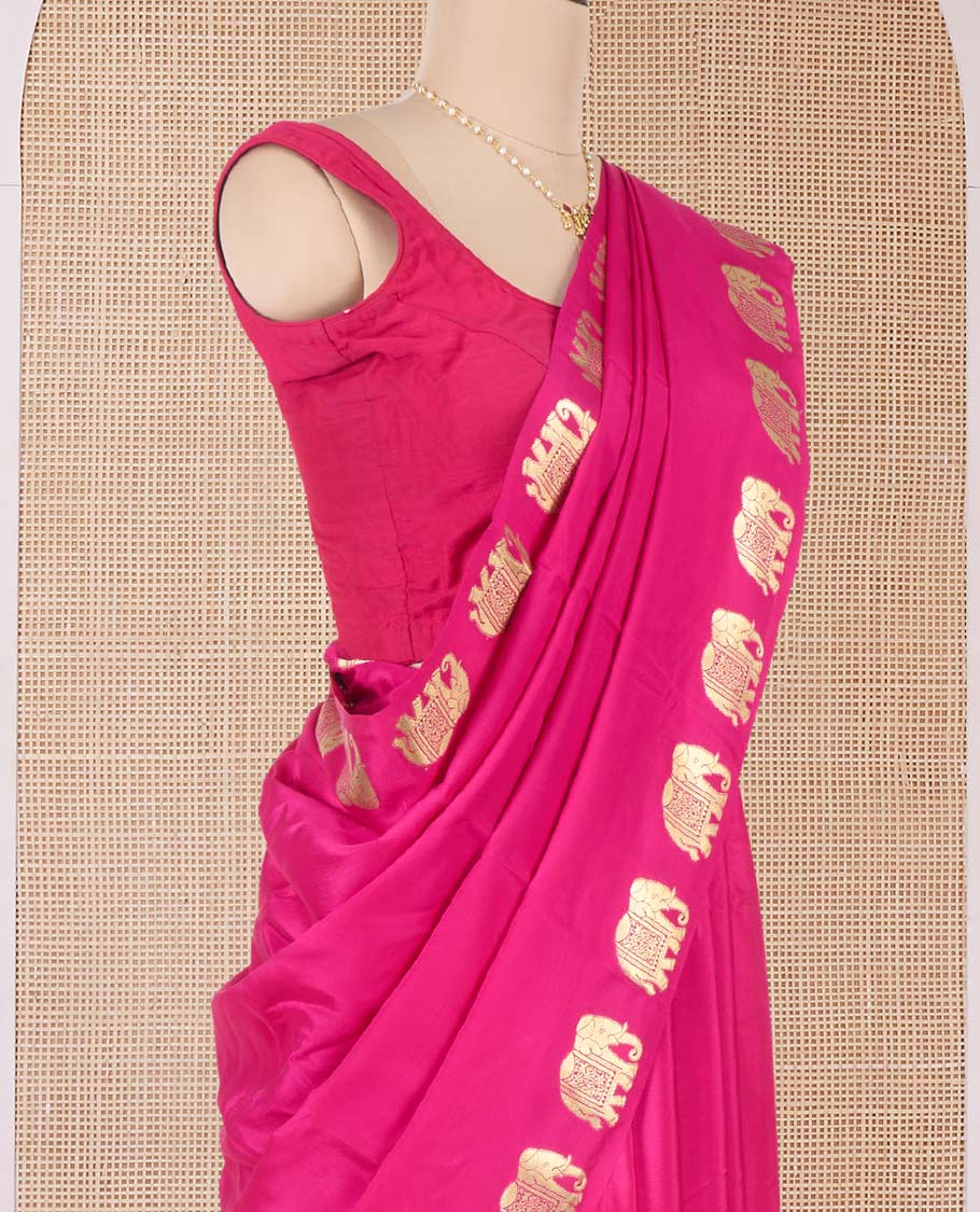 Pink plain Mysore silk saree with elephant motifs zari border, and pallu of miniatures of elephant motifs