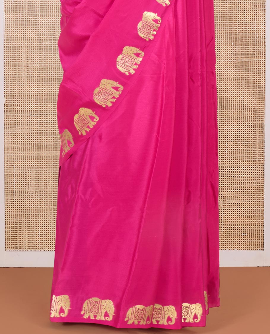 Pink plain Mysore silk saree with elephant motifs zari border, and pallu of miniatures of elephant motifs