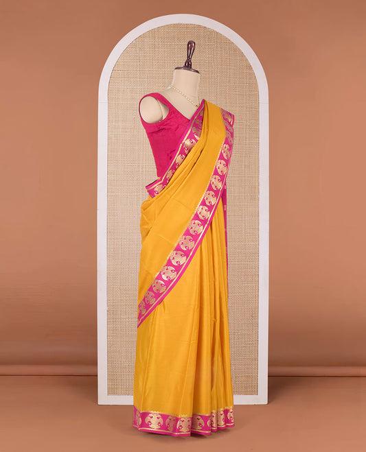 Yellow plain Mysore silk saree, contrast two-headed eagle zari border, and pallu of stripes