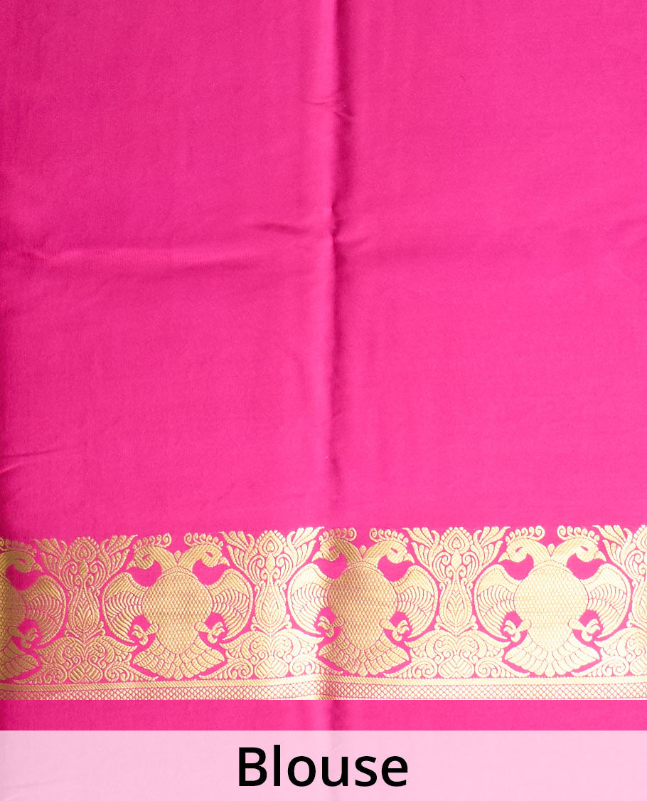 Parrot green plain Mysore silk saree, two-headed eagle zari border, and pallu steeped with two-headed eagle motifs