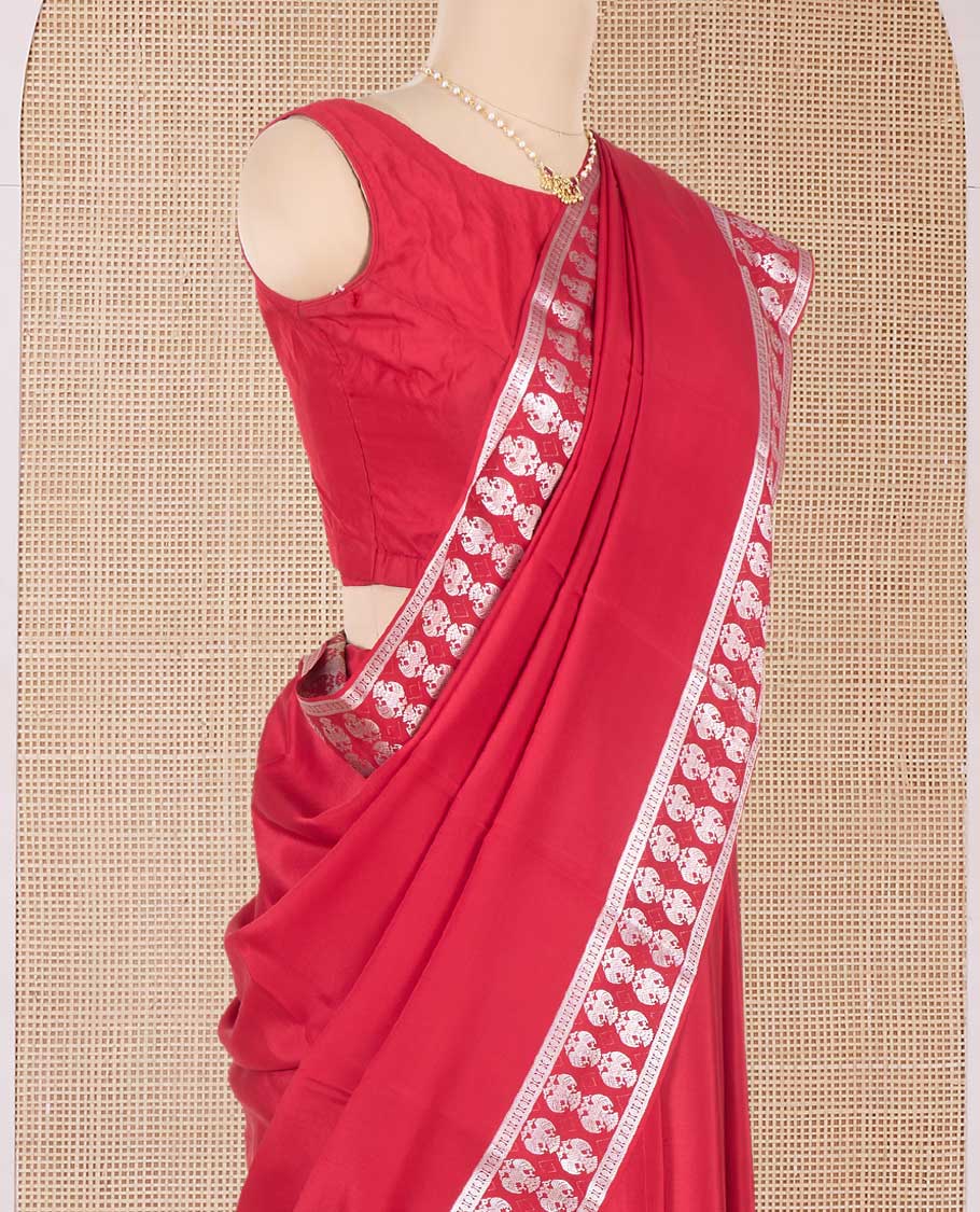 Red plain Mysore silk saree, two-headed eagle zari woven border, and pallu of two-headed eagle motifs