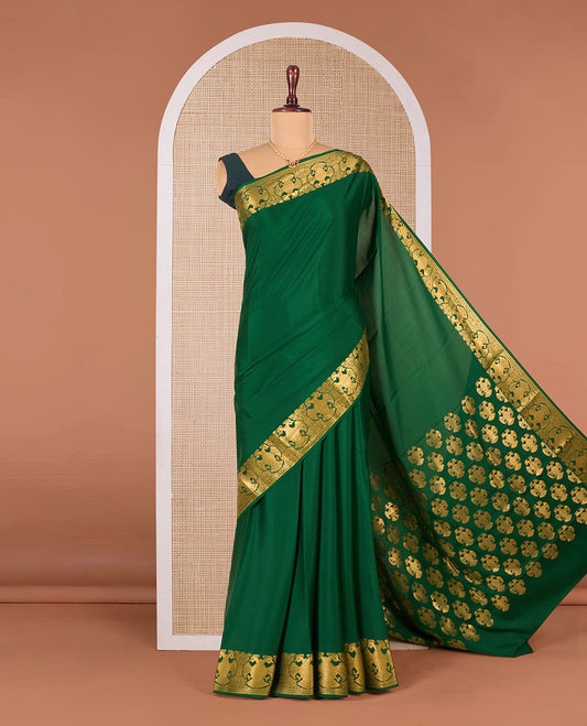 Green plain Mysore silk saree, two-headed eagle motifs zari woven border, and pallu steeped with two-headed eagle motifs