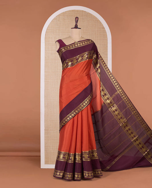 Orange plain Mysore silk saree, contrast traditional zari border, and pallu of zari stripes