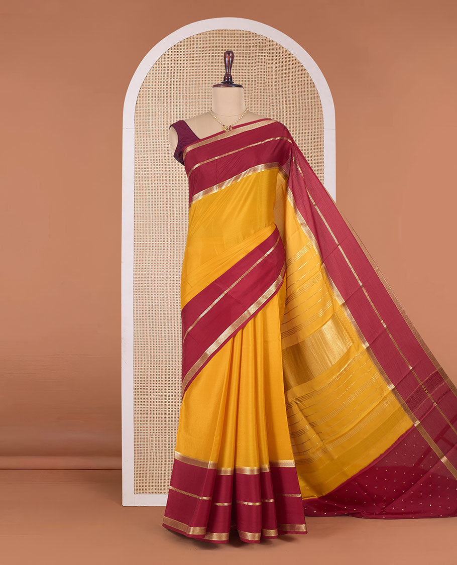 Yellow plain Mysore silk saree, contrast traditional zari border and pallu of zari designs