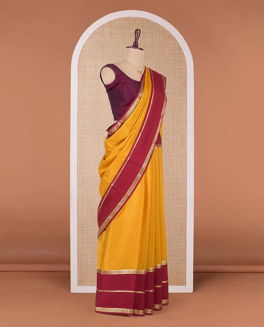 Yellow plain Mysore silk saree, contrast traditional zari border and pallu of zari designs