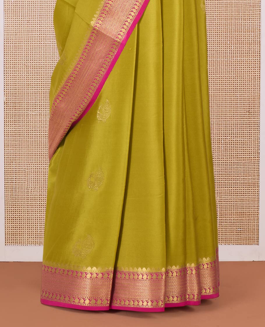 Green peacock motifs zari woven Mysore silk saree, contrast traditional zari border, and intricately designed pallu