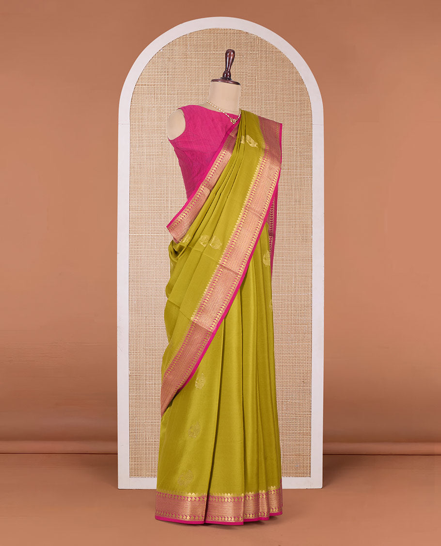 Green peacock motifs zari woven Mysore silk saree, contrast traditional zari border, and intricately designed pallu