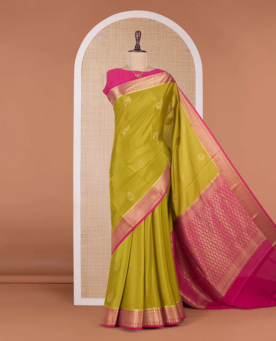 Green peacock motifs zari woven Mysore silk saree, contrast traditional zari border, and intricately designed pallu