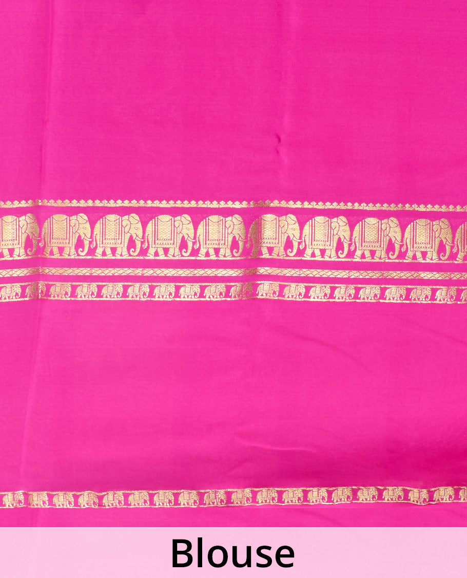 Pink plain Mysore silk saree, traditional zari border of elephant motifs, and zari striped pallu