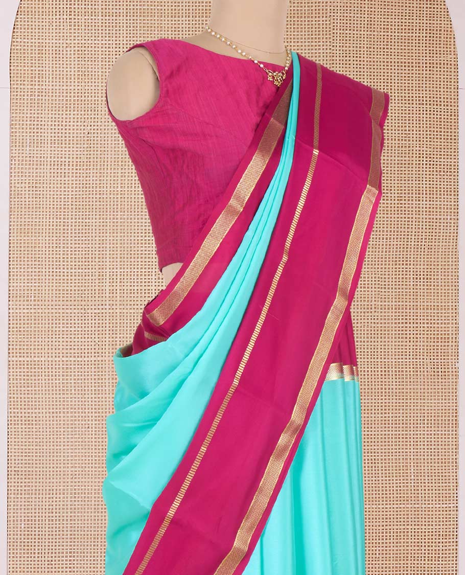 Turquoise plain Mysore silk saree, contrast traditional zari border, and zari-rich pallu