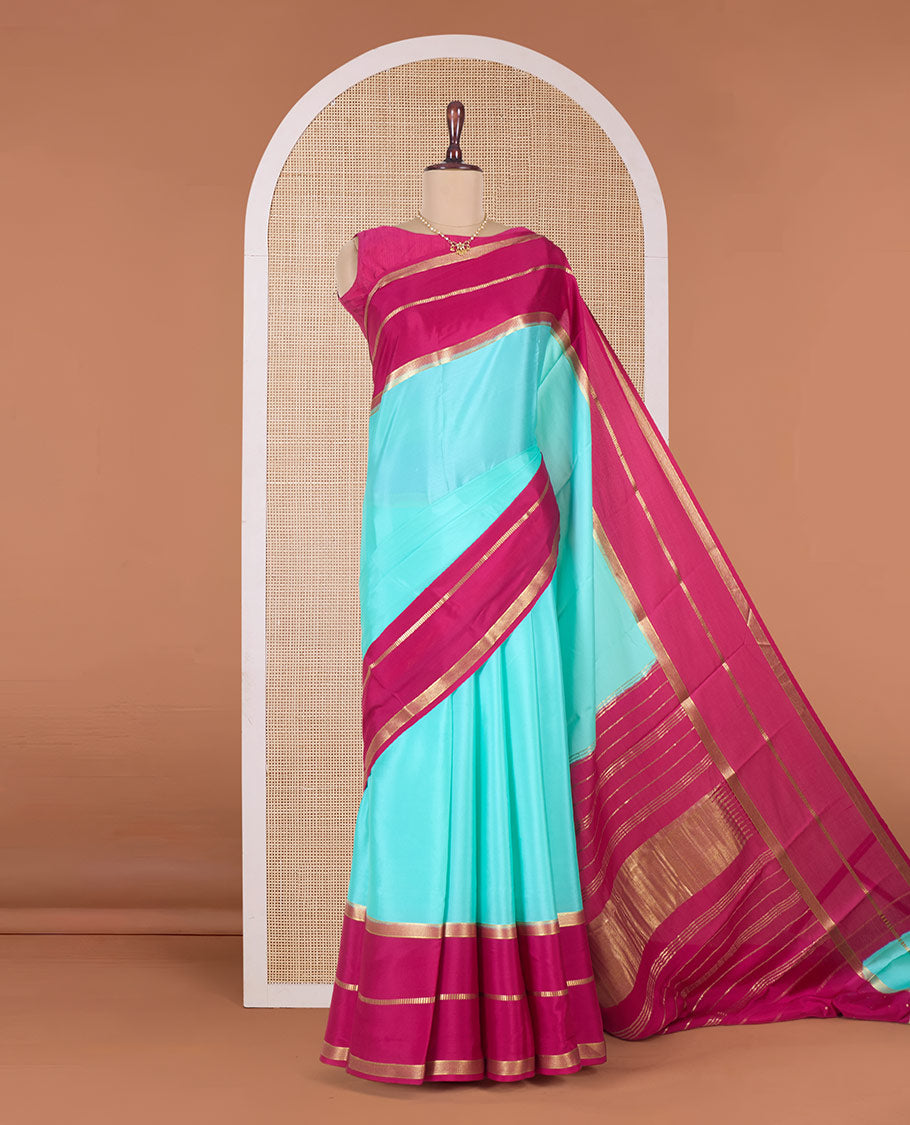 Turquoise plain Mysore silk saree, contrast traditional zari border, and zari-rich pallu