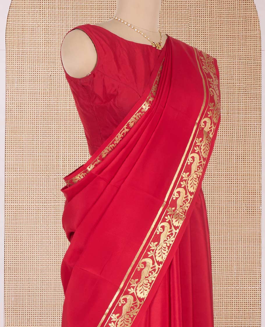 Red plain Mysore silk saree, peacock motifs zari border l, and zari striped pallu