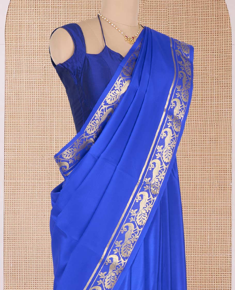 Royal blue plain Mysore silk saree, peacock motifs zari border l, and zari striped pallu