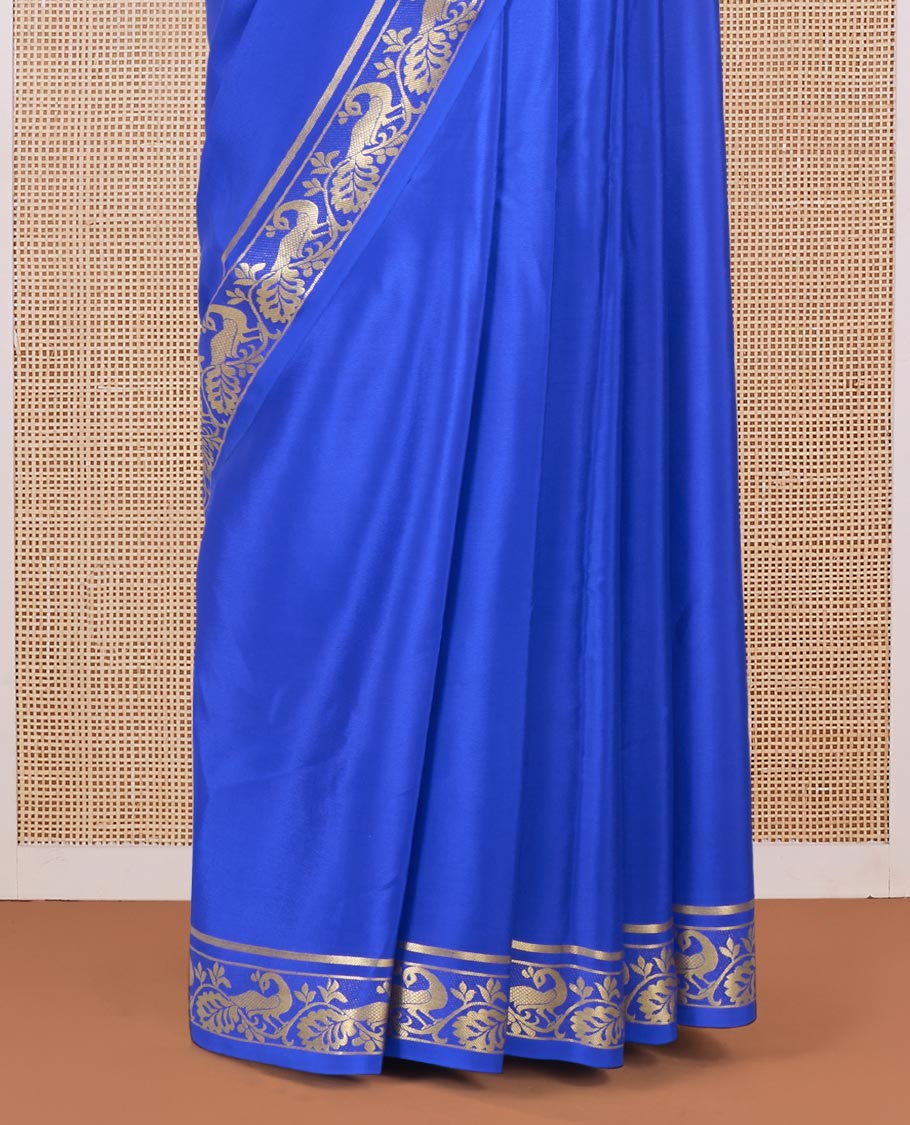 Royal blue plain Mysore silk saree, peacock motifs zari border l, and zari striped pallu