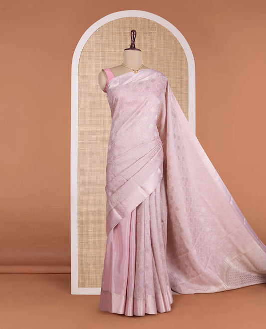 Peach floral jacquard Mysore silk saree, traditional zari border, and zari-rich jaal pallu