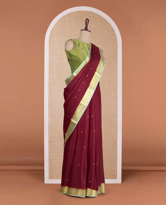 Maroon zari buttas Mysore silk saree, contrast floral jaal design border, and zari deisgn pallu
