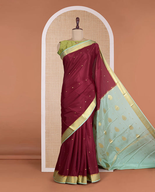 Maroon zari buttas Mysore silk saree, contrast floral jaal design border, and zari deisgn pallu