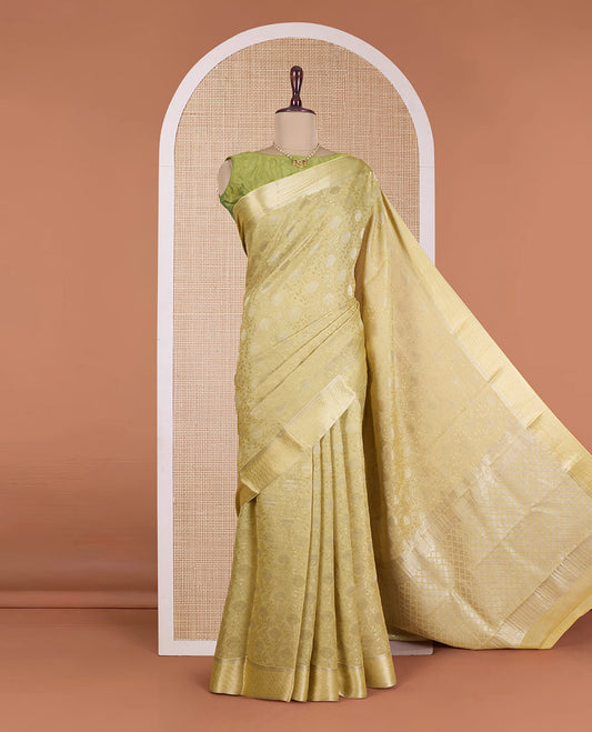 Green floral jacquard Mysore silk saree, traditional zari border, and zari-rich jaal pallu