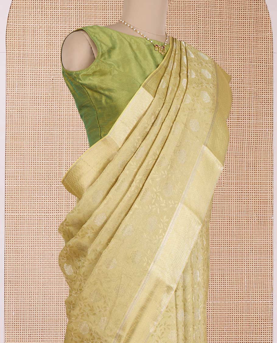 Green floral jacquard Mysore silk saree, traditional zari border, and zari-rich jaal pallu