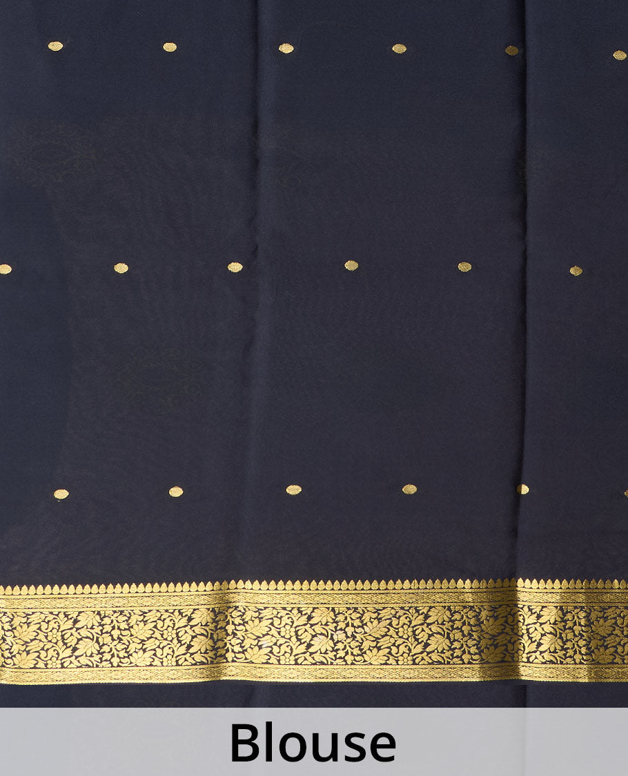 Pale green zari buttas Mysore silk saree, contrast floral vine design border, and thilakam motifs pallu