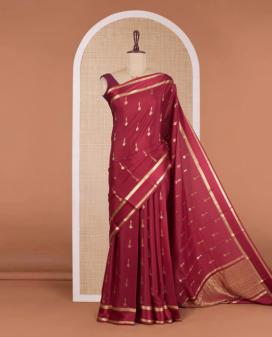 Maroon zari buttas Mysore silk saree, temple zari rettai pettu border, and jaal pallu
