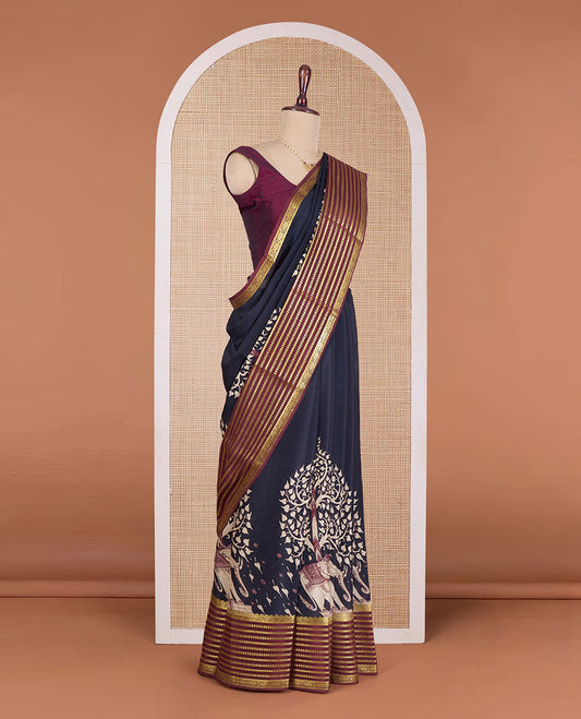 Blue tree of life and elephant motifs printed Mysore silk saree, contrast traditional zari design border, and zari striped pallu