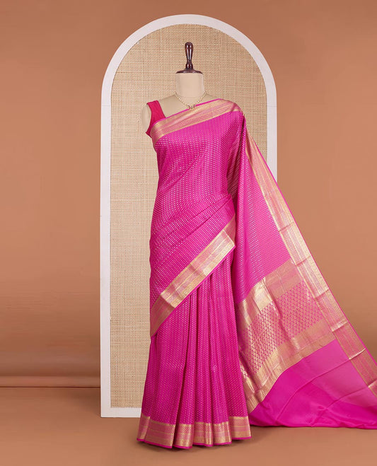 Rani pink zari buttas Mysore silk saree, traditional zari woven border, and pallu of thilakam motifs