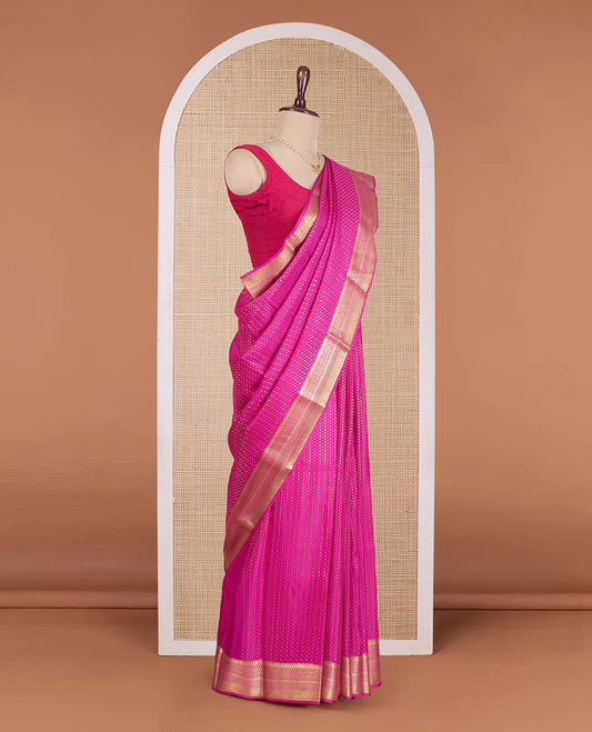 Rani pink zari buttas Mysore silk saree, traditional zari woven border, and pallu of thilakam motifs