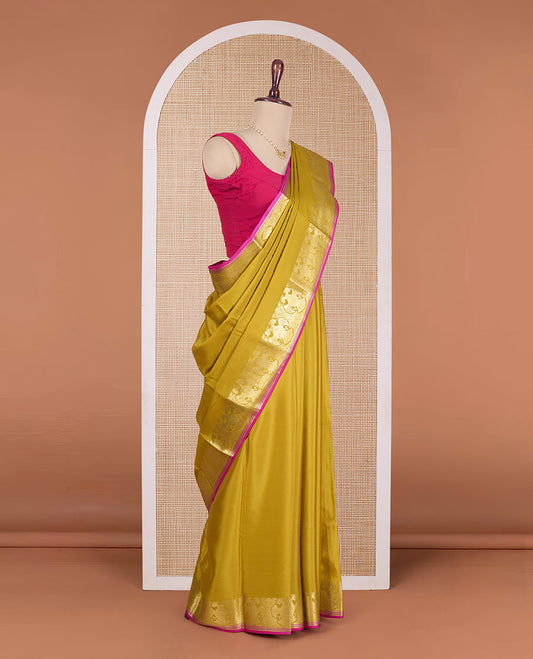 Mustard plain Mysore silk saree, two-headed eagle motifs woven border, and contrast pallu of two-headed eagle motifs