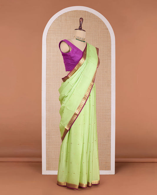 Green zari buttas Mysore silk saree, contrast traditional zari design border, and zari striped pallu