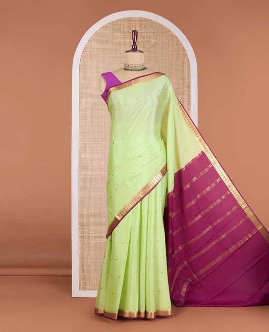 Green zari buttas Mysore silk saree, contrast traditional zari design border, and zari striped pallu