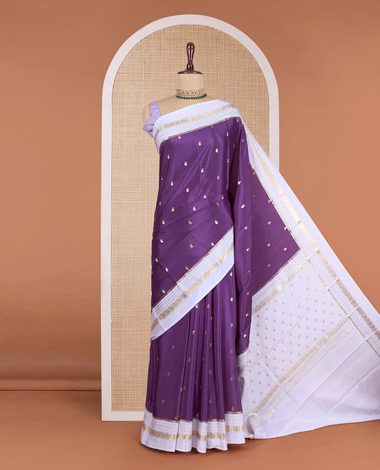 Purple manga buttas Mysore silk saree, contrast border of traditional zari designs, and pallu steeped with manga motifs