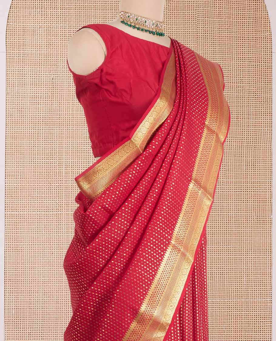 Red plain Mysore silk saree, two-headed eagle motifs woven border, and pallu steeped with two-headed eagle motifs