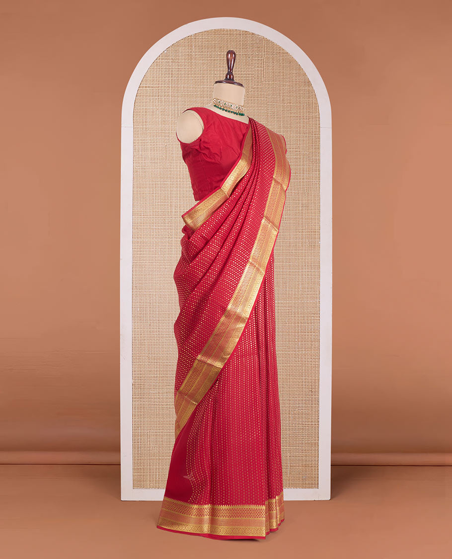 Red plain Mysore silk saree, two-headed eagle motifs woven border, and pallu steeped with two-headed eagle motifs