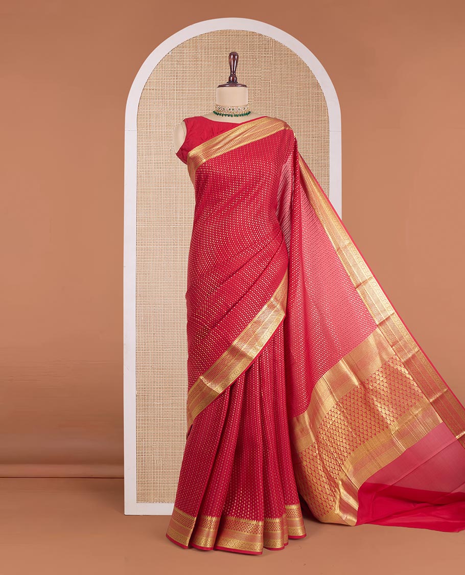 Red plain Mysore silk saree, two-headed eagle motifs woven border, and pallu steeped with two-headed eagle motifs