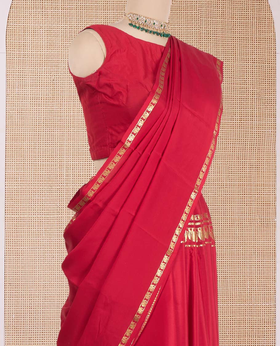 Red plain Mysore silk saree, zari border of elephant motifs, and zari striped pallu