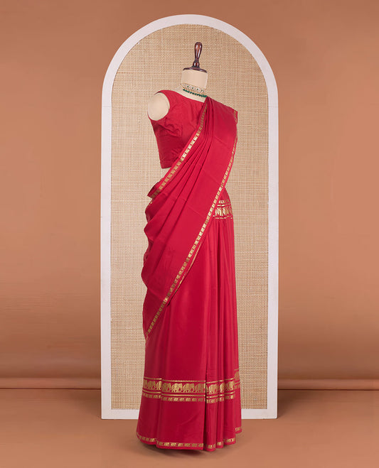 Red plain Mysore silk saree, zari border of elephant motifs, and zari striped pallu
