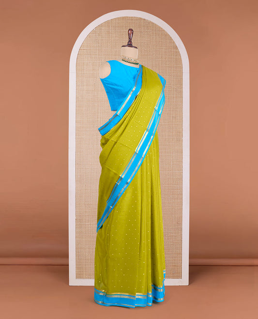 Green zari buttas Mysore silk saree, contrast traditional zari rettai pettu border, and zari striped pallu