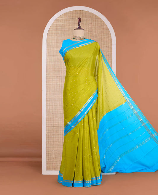 Green zari buttas Mysore silk saree, contrast traditional zari rettai pettu border, and zari striped pallu