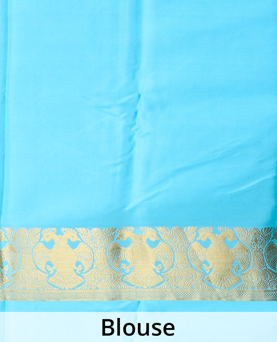 Blue plain Mysore silk saree, zari border of two-headed eagle motifs, and pallu steeped with two-headed eagle motifs