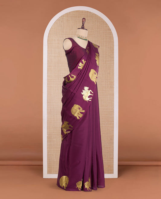 Maroon plain Mysore silk saree, zari border of elephant and kuthirai motifs, and pallu of minature animal motifs