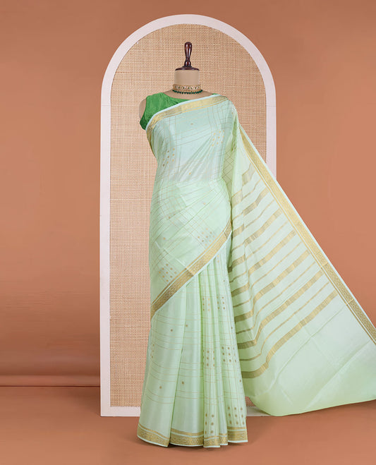 Green zari buttas and checked Mysore silk saree, traditional zari design border, and zari design pallu