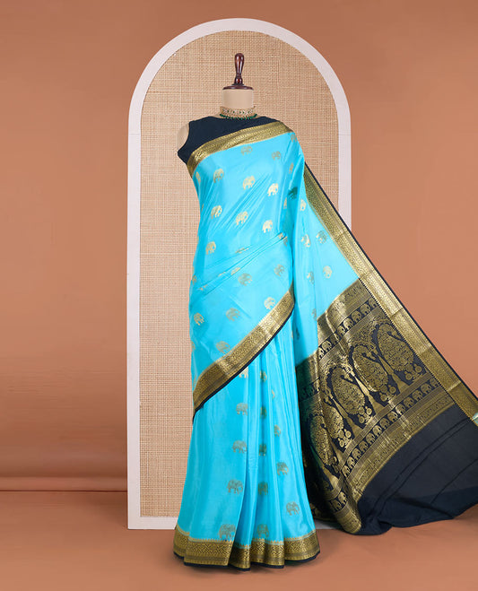 Blue elephant buttas Mysore silk saree, contrast traditional zari border, and pallu of big paisleys