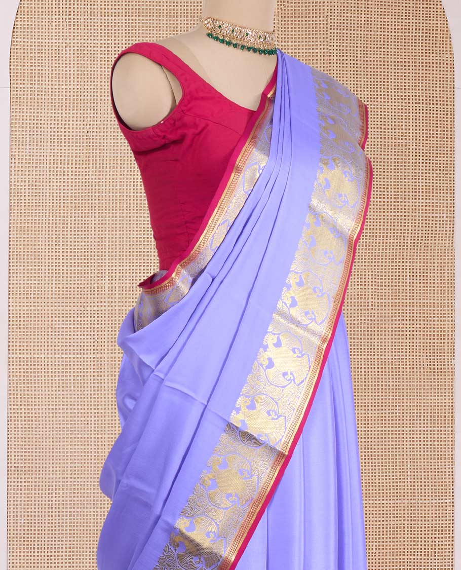 Violet plain Mysore silk saree, zari border of two-headed eagle motifs, and contrast pallu steeped with two-headed eagle motifs