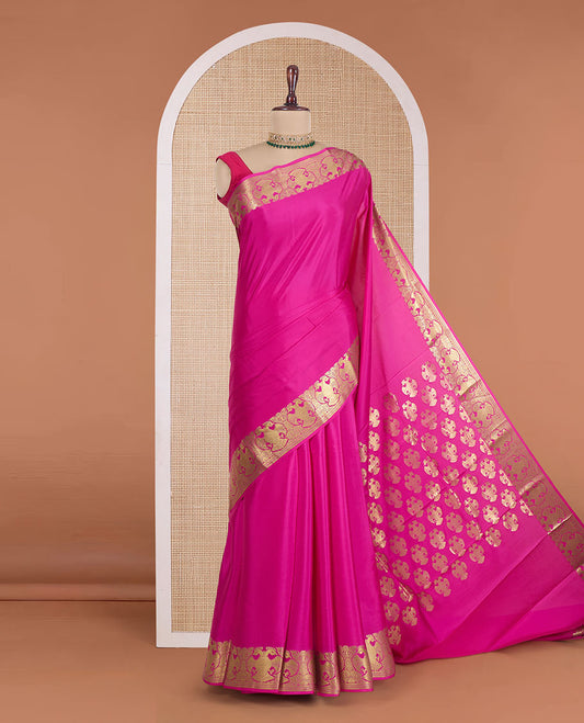 Rani pink plain Mysore silk saree, zari border of two-headed eagle motifs, and pallu steeped with two-headed eagle motifs