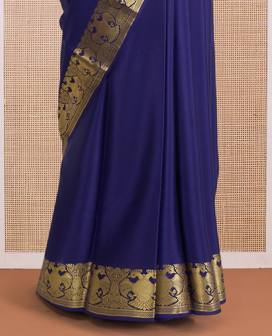 Navy blue plain Mysore silk saree, zari border of two-headed eagle motifs, and pallu steeepd with two-headed eagle motifs