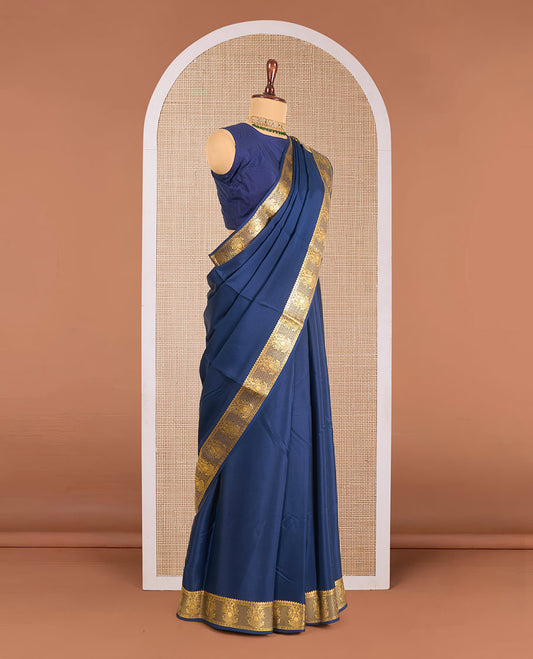 Navy blue plain Mysore silk saree, traditional zari border of two-headed eagle motifs in zari, and zari design pallu