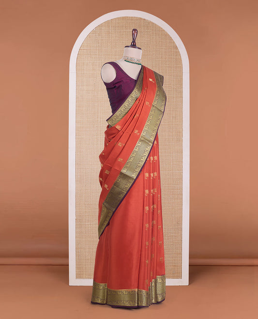 Orange zari buttas Mysore silk saree, contrast traditional zari border of peacock motifs, and jaal pallu